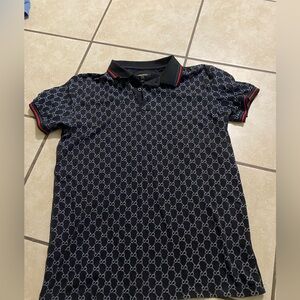 Men's Black Polo with Red-Trim Collar and Interlock Pattern